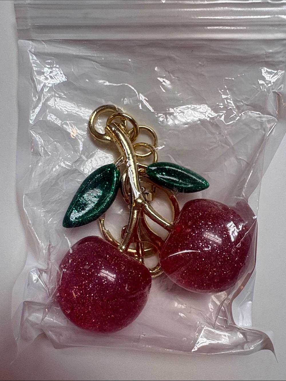 Gold Cherry Pendant Necklace with Sparkling pink Cherries and Green Leaves